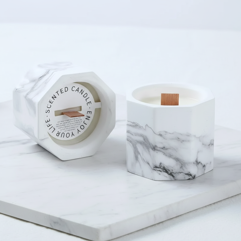 Marble geometric candle close-up on white marble surface