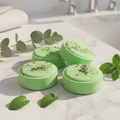 Shower steamers on marble bathroom surface with eucalyptus